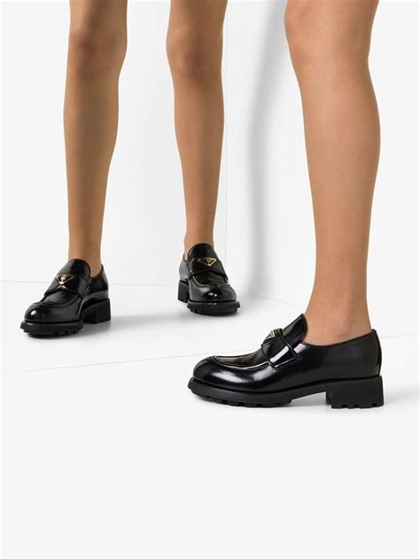 Prada Women's' Logo Plaque Leather Loafers in Black 